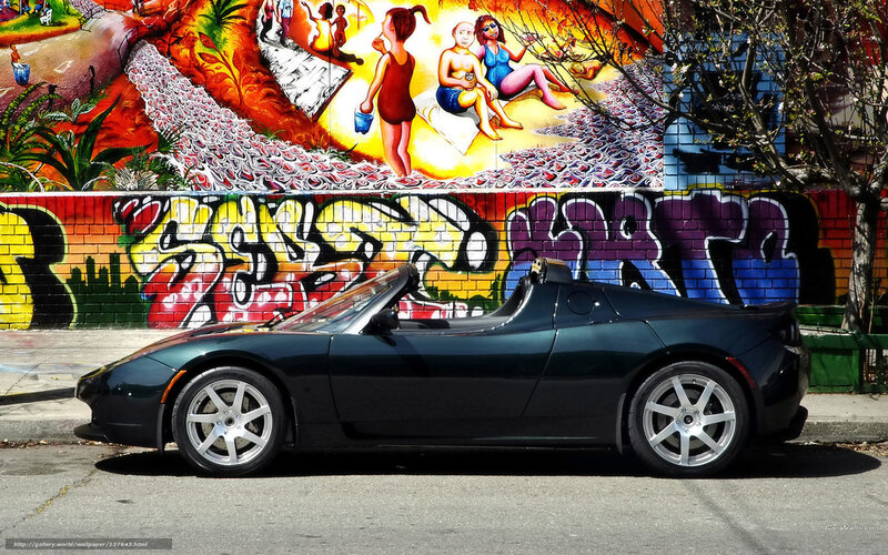 Tesla Roadster in front of mural
