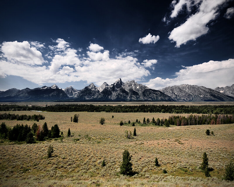 Teton Range under cloudy sky