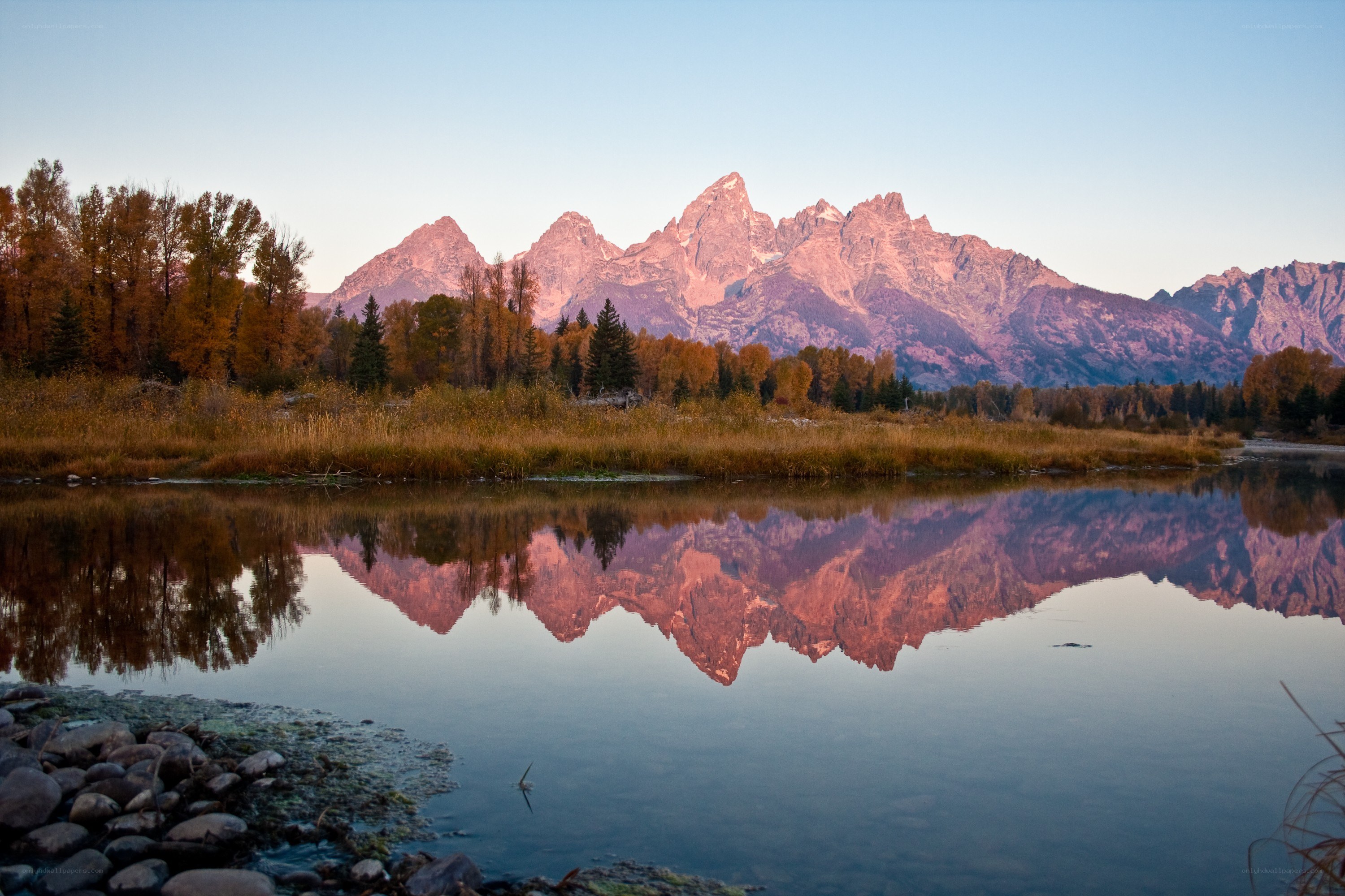 Tetons reflected in a calm lake