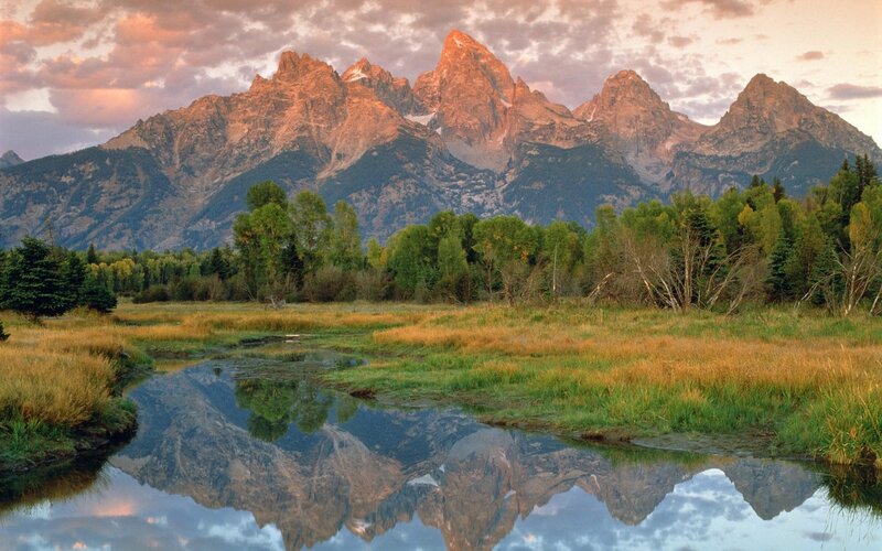 Tetons reflected in a calm river
