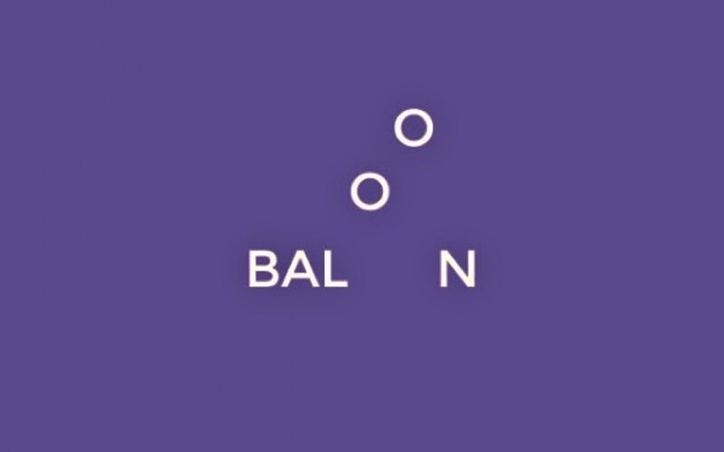Text and Circles on Purple