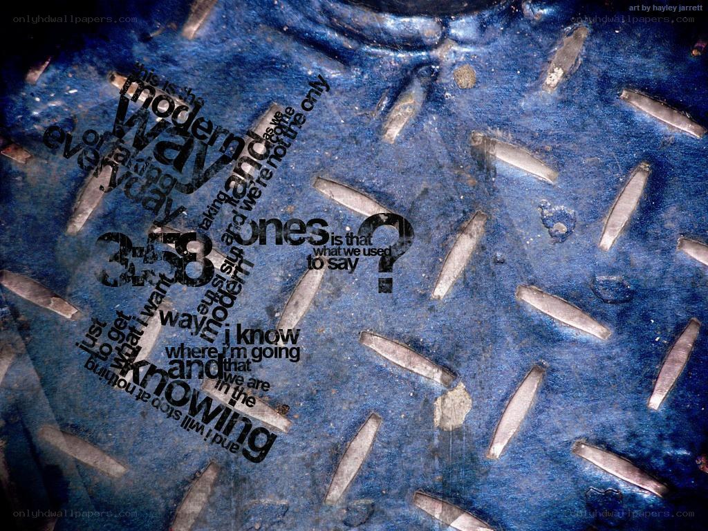 text art on blue metal