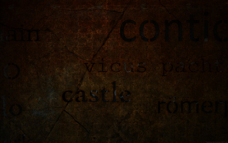 text collage on cracked surface