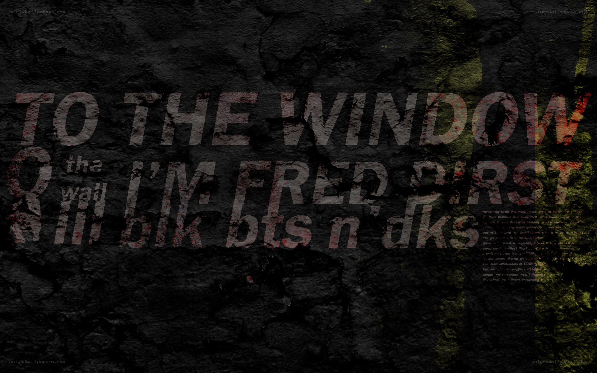 text on a dark wall