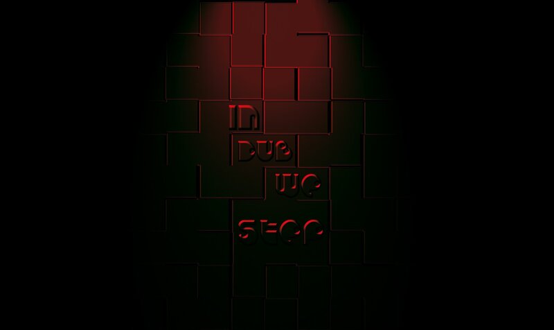 text on dark block wall