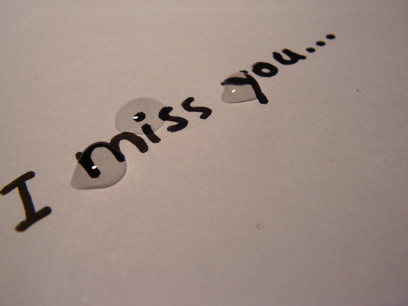 Text on Paper with Water Droplets