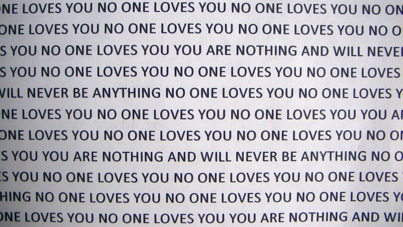 text repeating 'no one loves you'