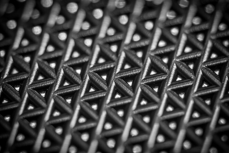 textured black grid pattern