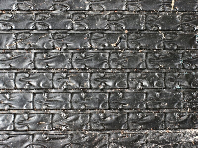 textured black rubber mat