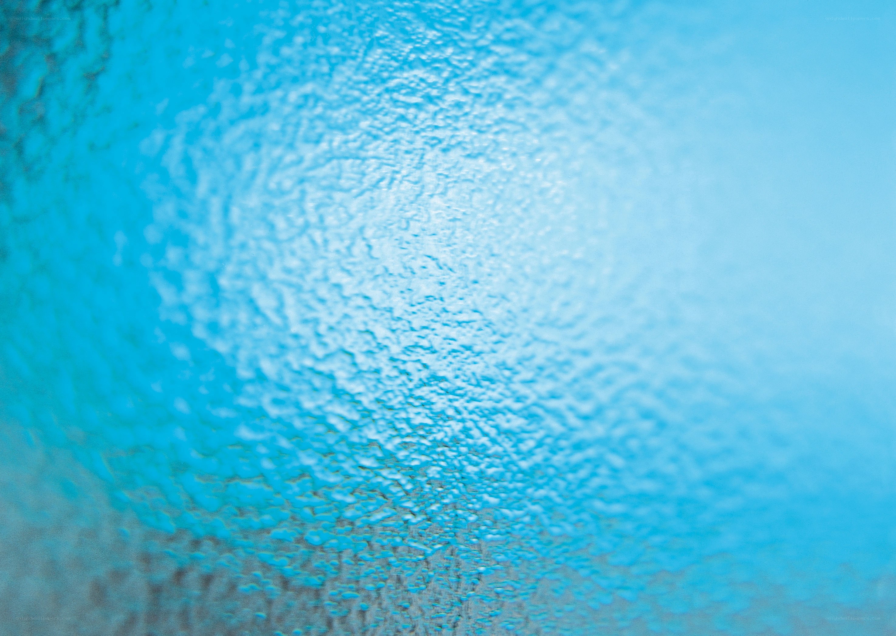 textured blue glass surface