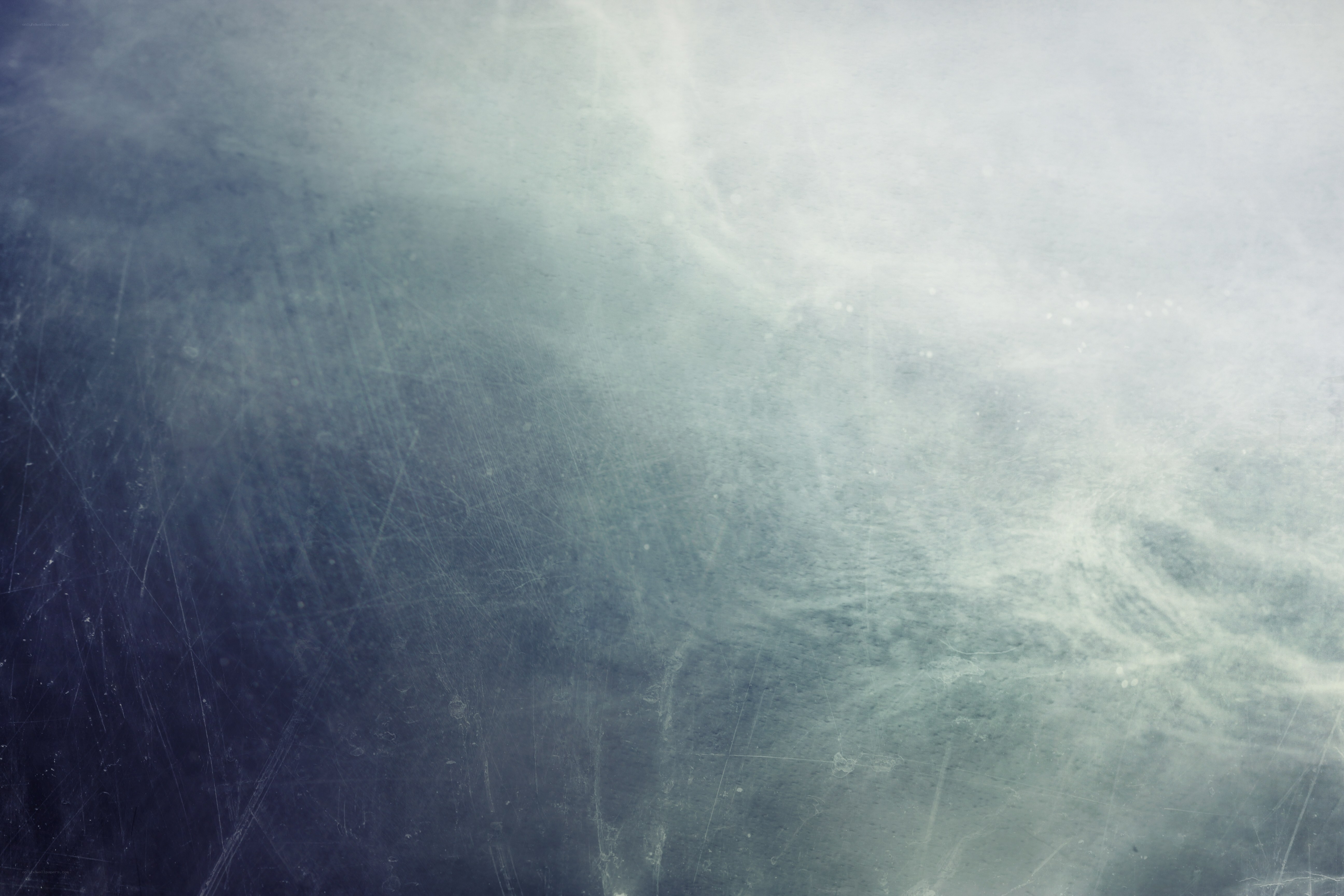 textured blue-gray surface