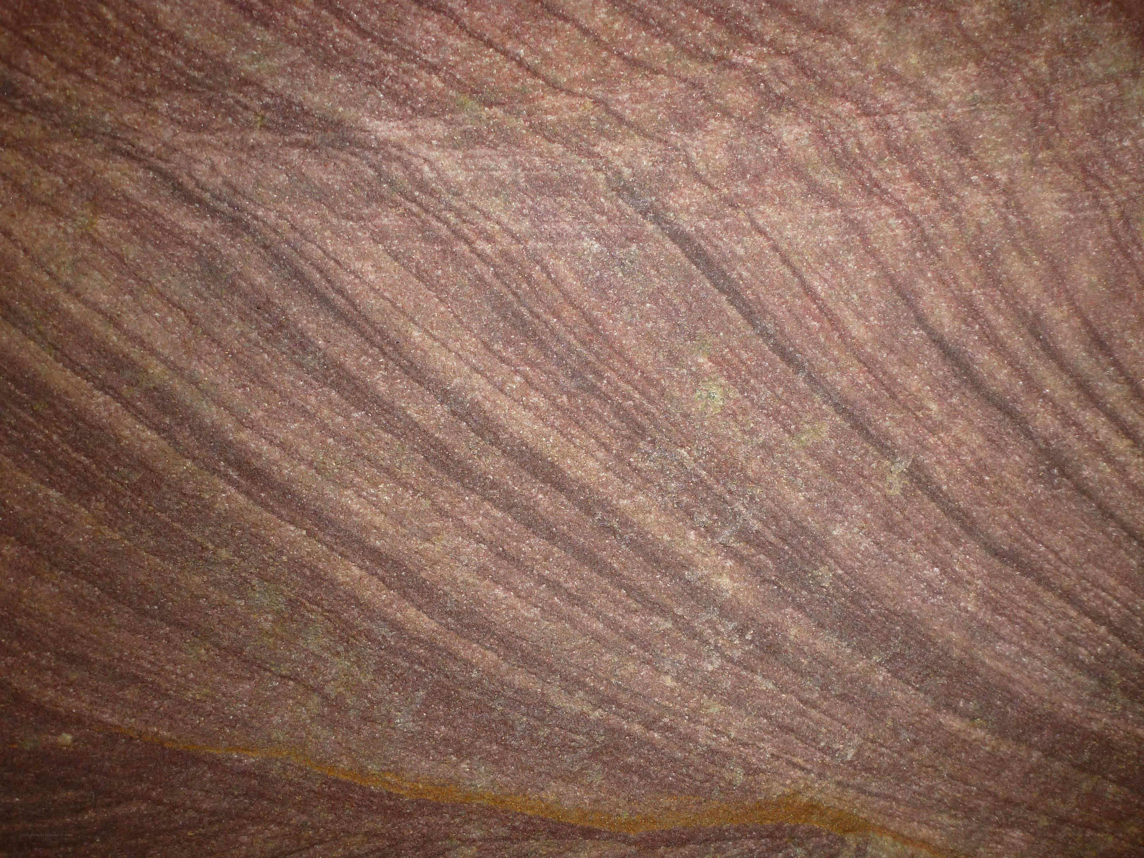 textured brown stone surface