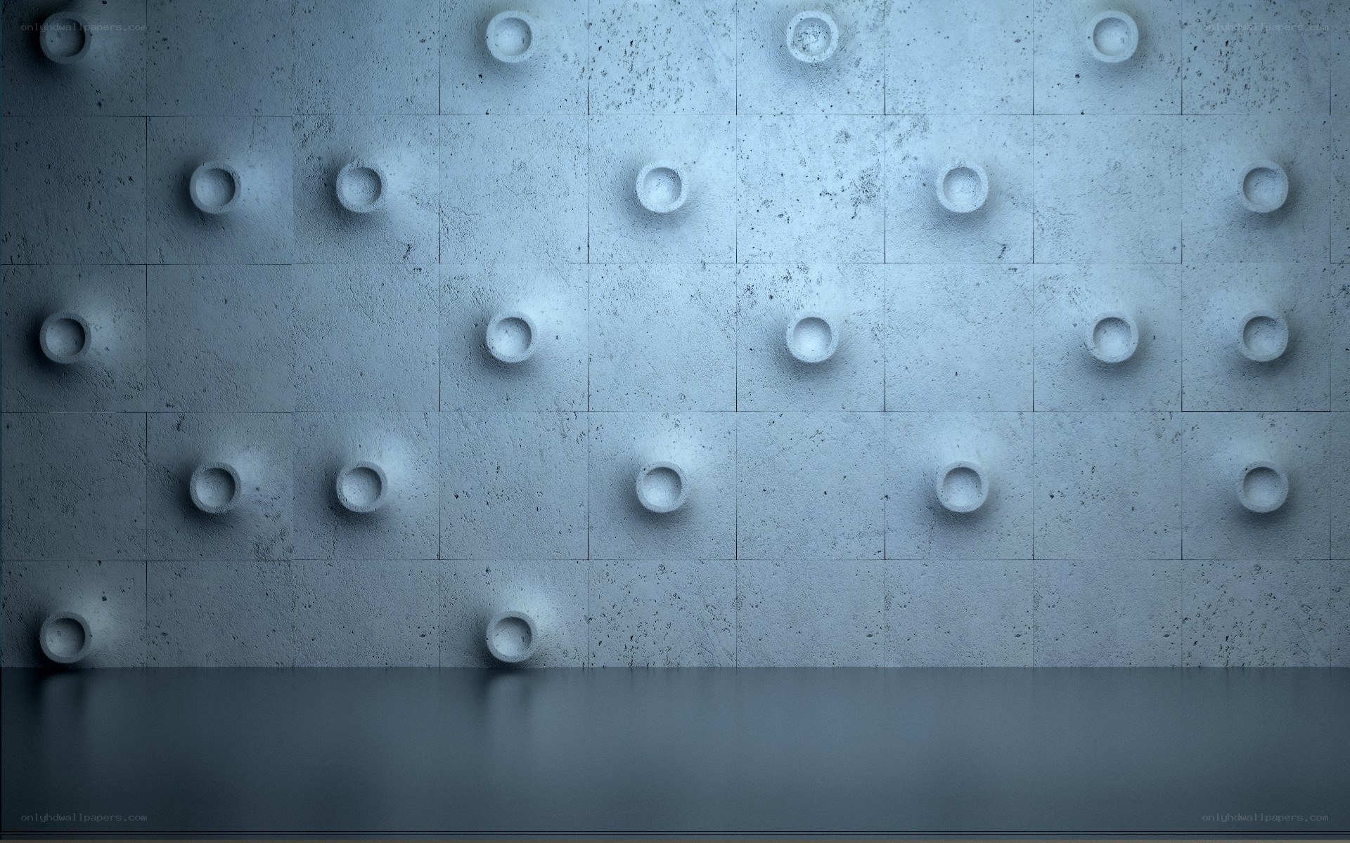 textured concrete wall with circular indentations