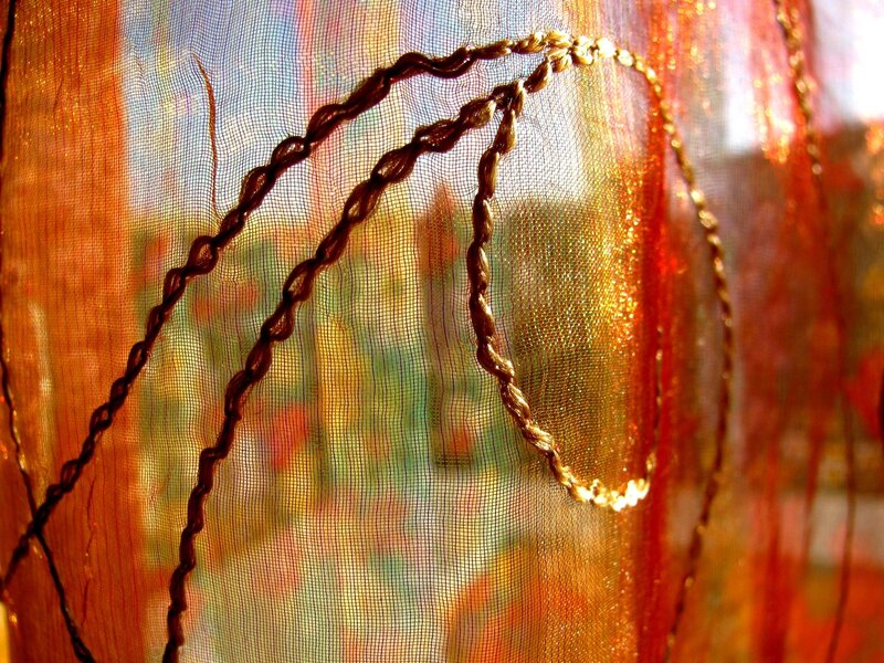 textured fabric with golden threads