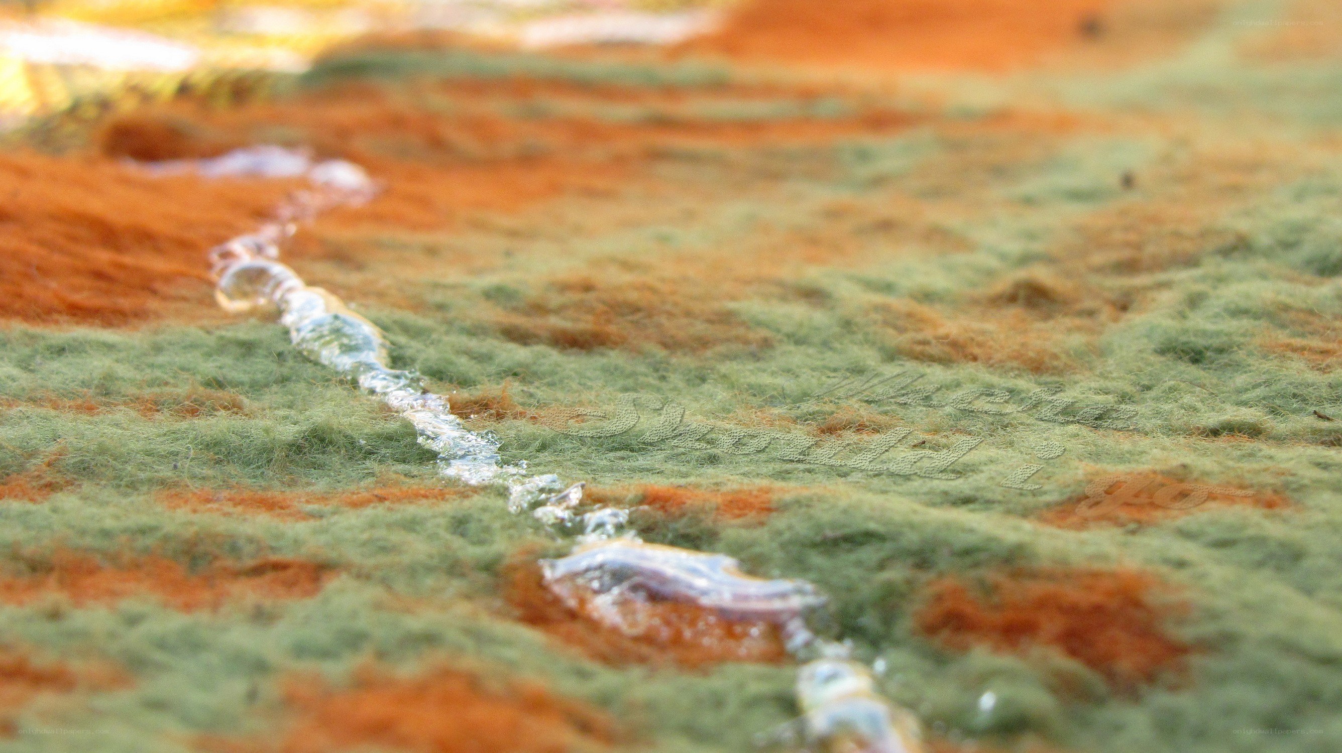 textured fabric with water droplets