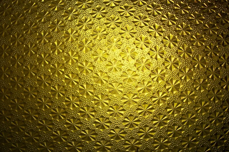 Textured Gold Surface — Dramatic, Photograph