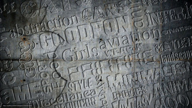 textured metal wall with embossed words