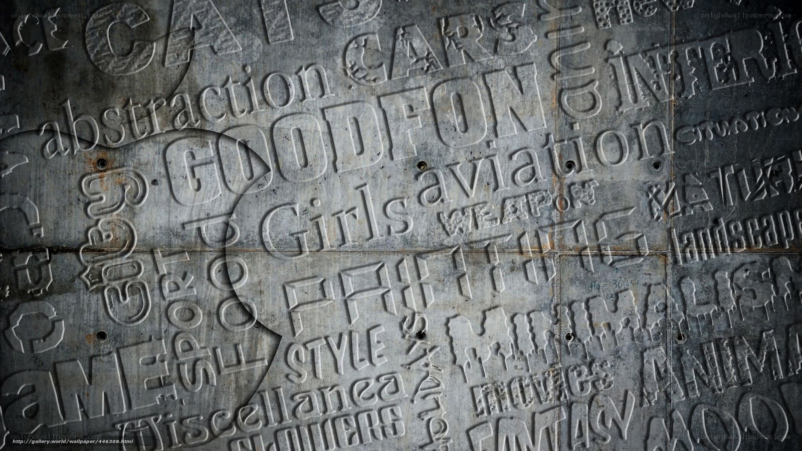 textured metal wall with embossed words