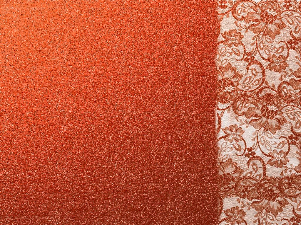 textured orange fabric with lace