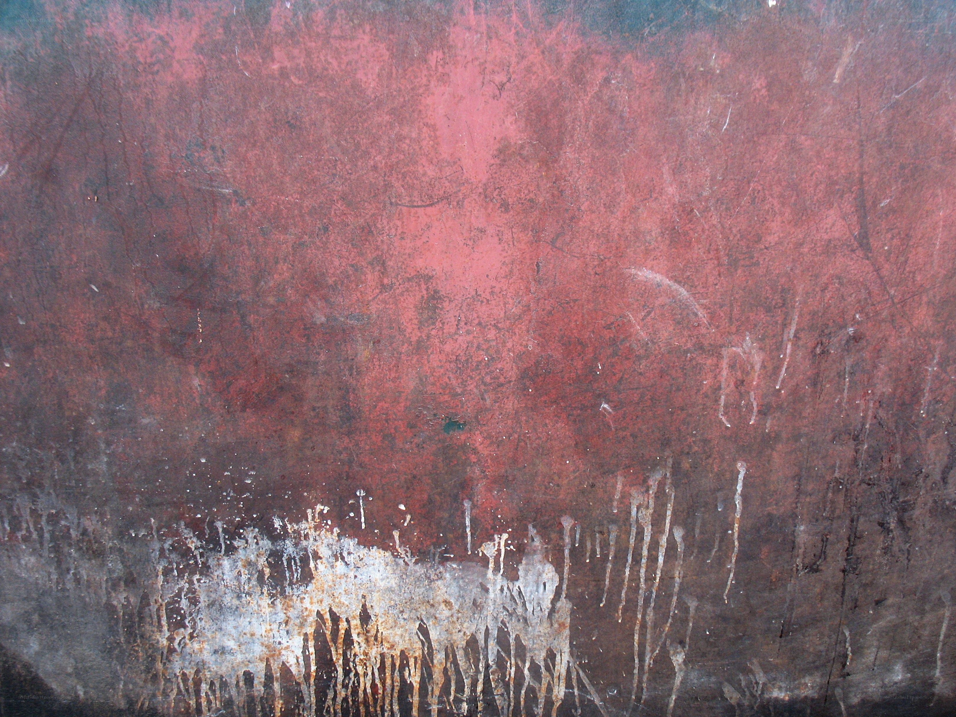 textured red surface with drips