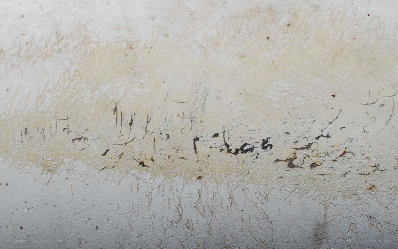 textured surface with stains