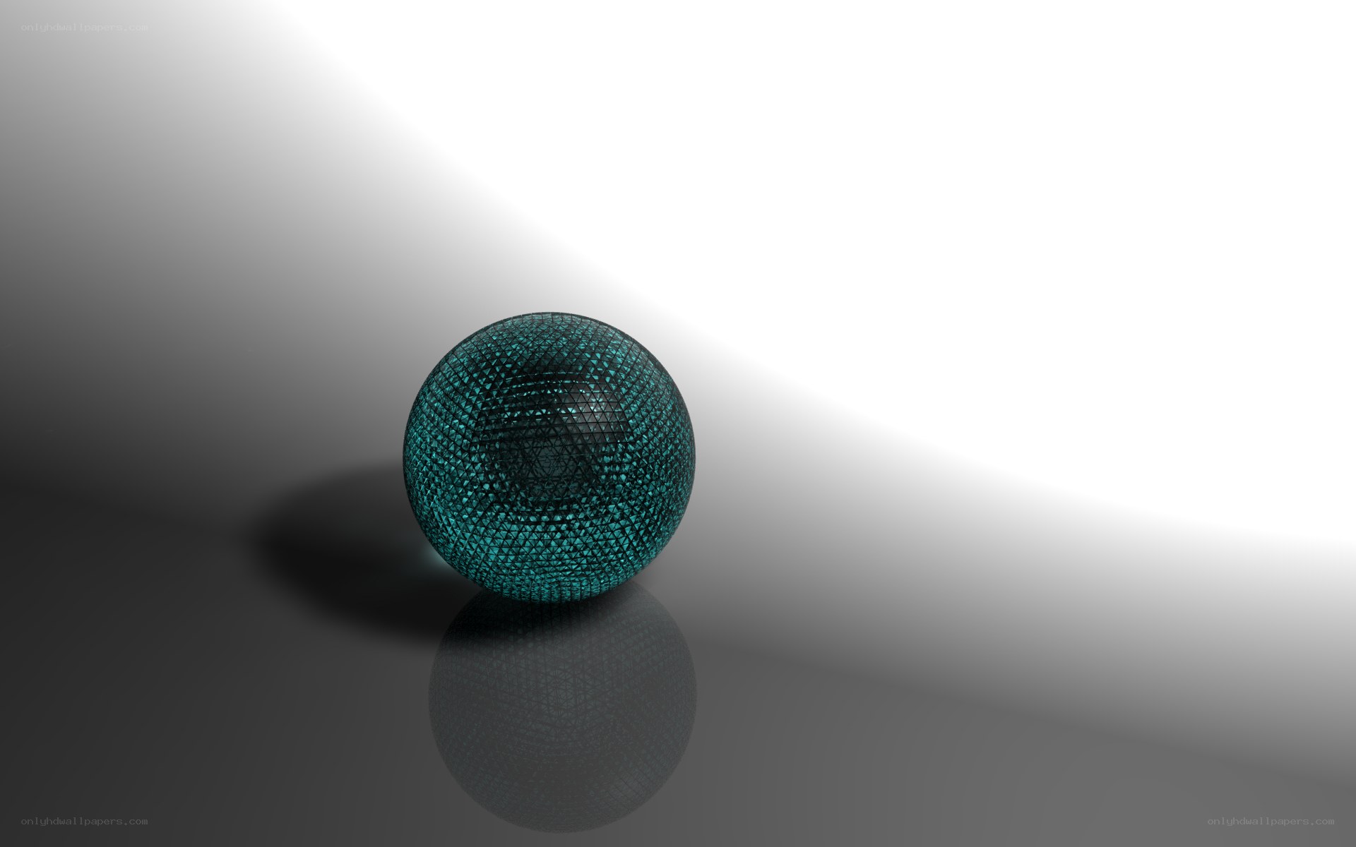 textured teal sphere on reflective surface