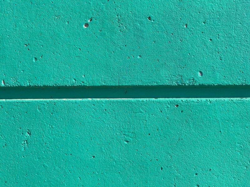 textured teal wall surface
