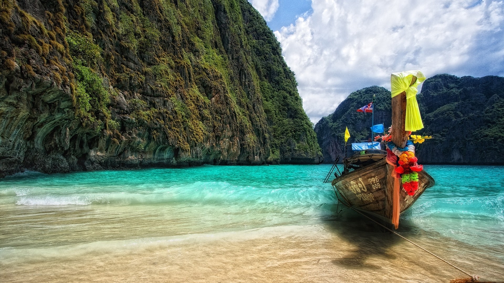 Thai longtail boat at tropical beach