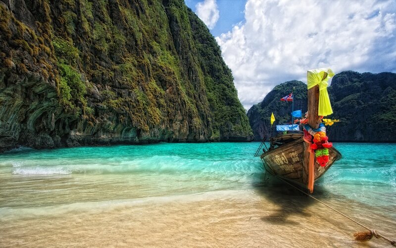 Thai longtail boat on tropical beach