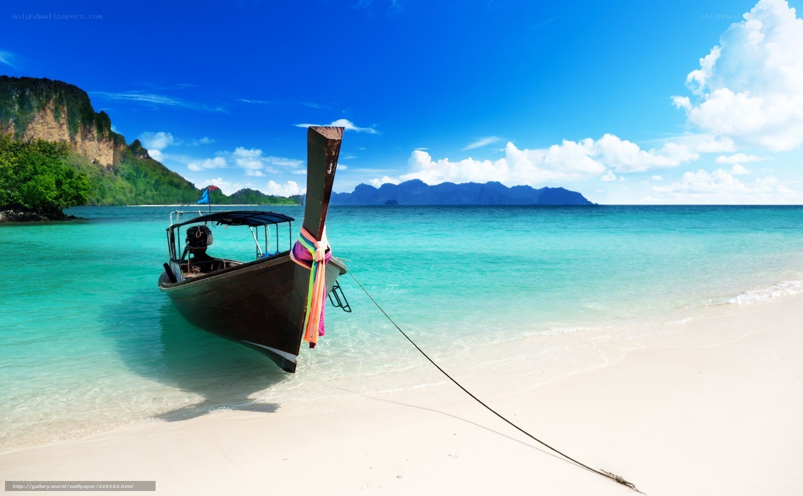 Thai longtail boat on tropical beach
