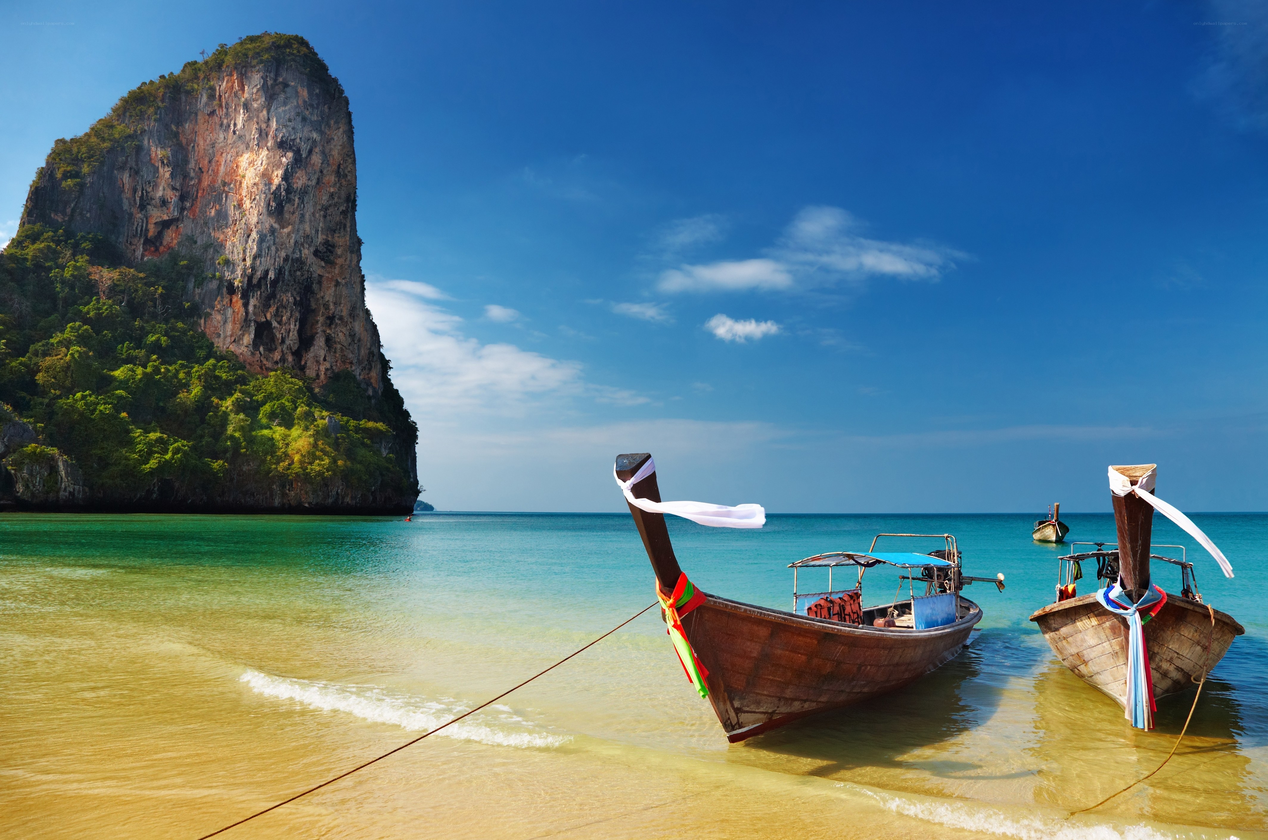 Thai longtail boats at beach