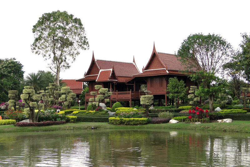 Thai-style house by a pond