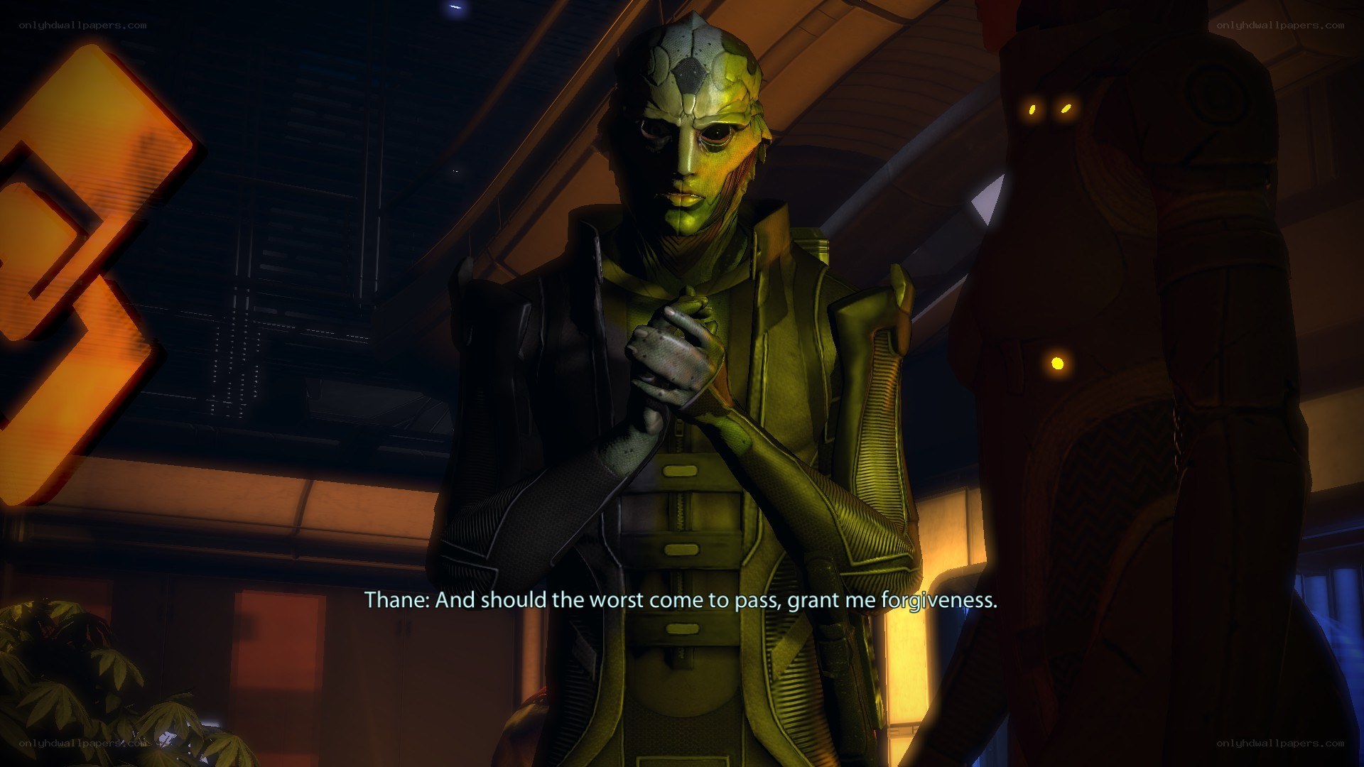 Thane in a dimly lit room