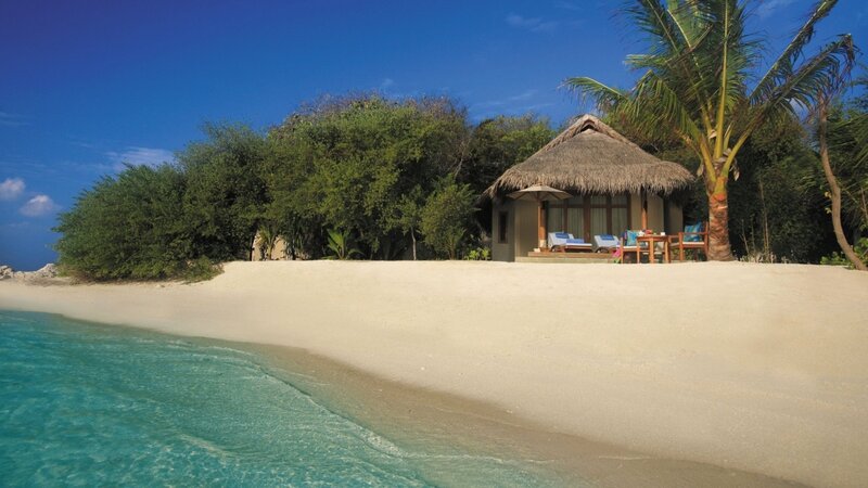 Thatched Beach Hut — Blue, Serene, Afternoon