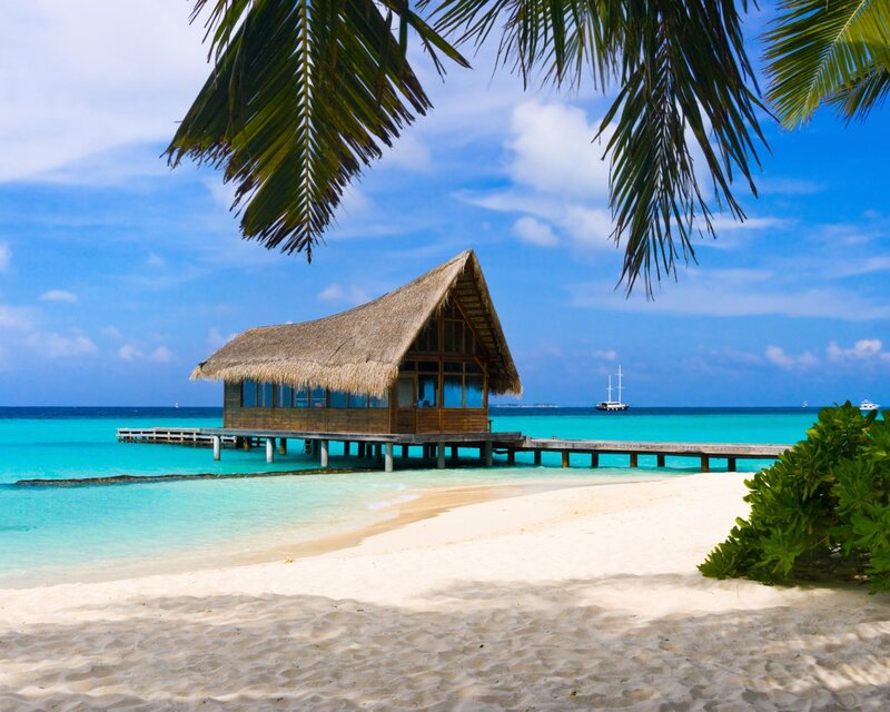 Thatched Bungalow on Pier — Blue
