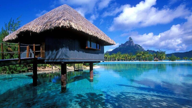Thatched Bungalow over Water — Blue