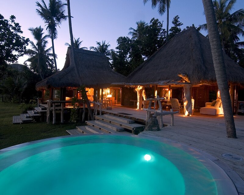 Thatched Bungalows at Dusk — Teal