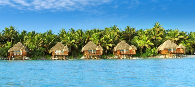 Thatched Bungalows on Beach — Blue