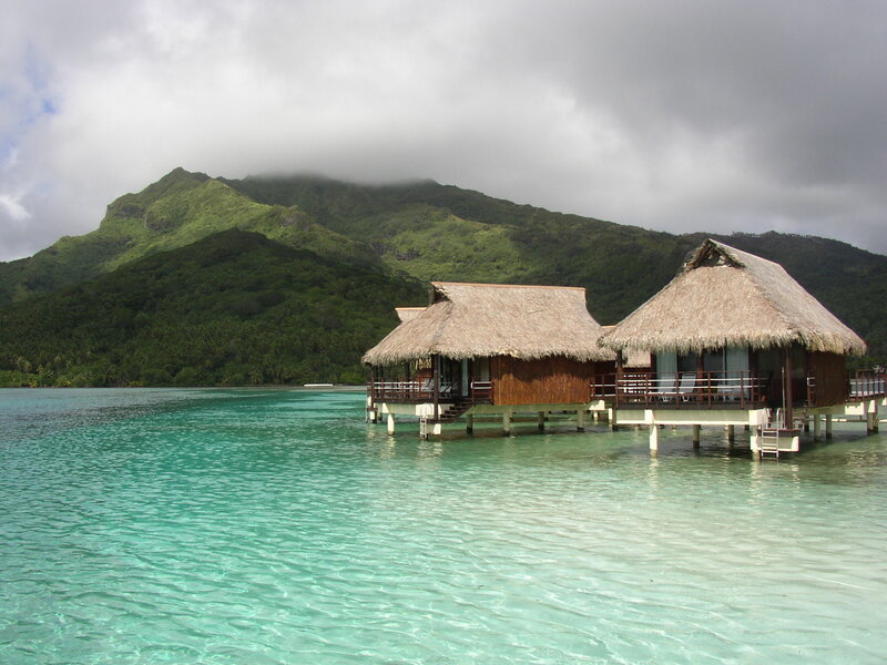Thatched Bungalows on Water — Blue, Serene