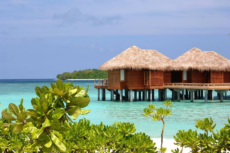 Thatched Bungalows on Water — Blue