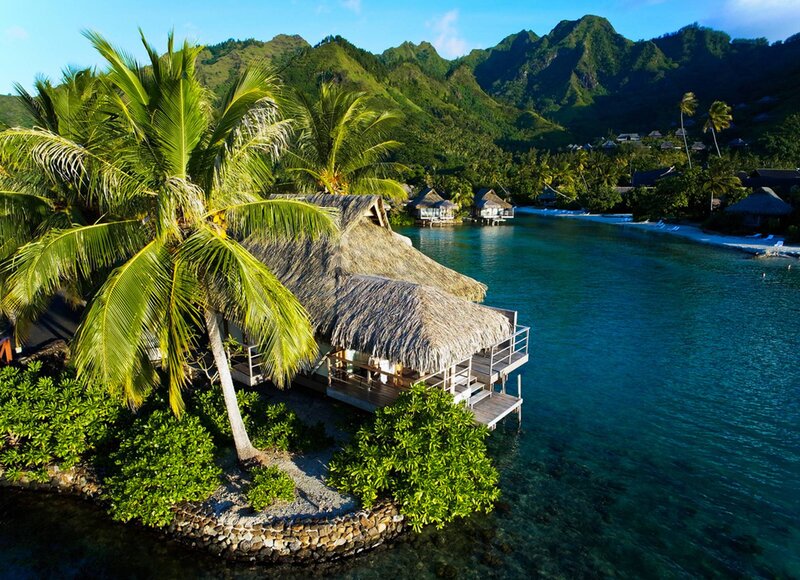 Thatched Bungalows on Water — Green