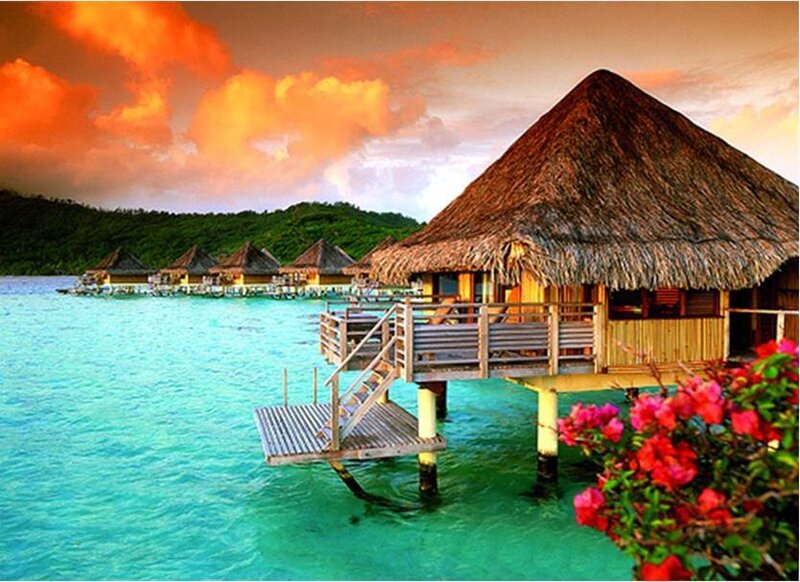 Thatched Bungalows over Water — Blue, Serene, Sunset