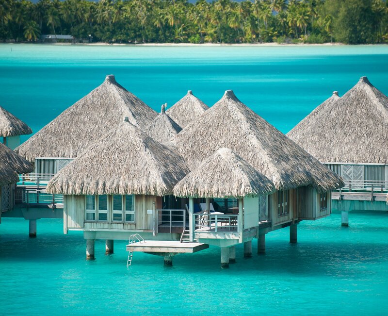 Thatched Bungalows over Water