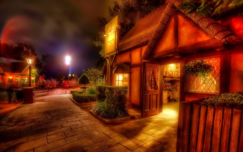 Thatched Cottage at Night — Orange, Cozy