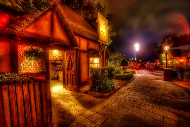 Thatched Cottage at Night — Orange