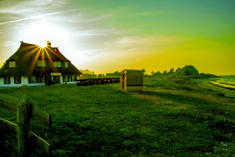Thatched Cottage at Sunset