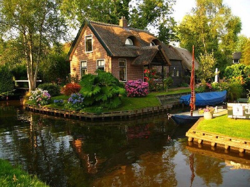 Thatched Cottage by Canal — Green, Serene, Afternoon