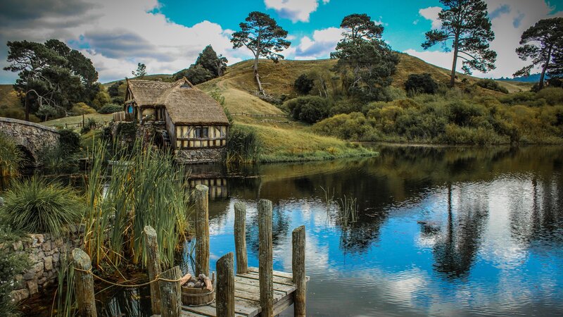 Thatched Cottage by Lake — Blue