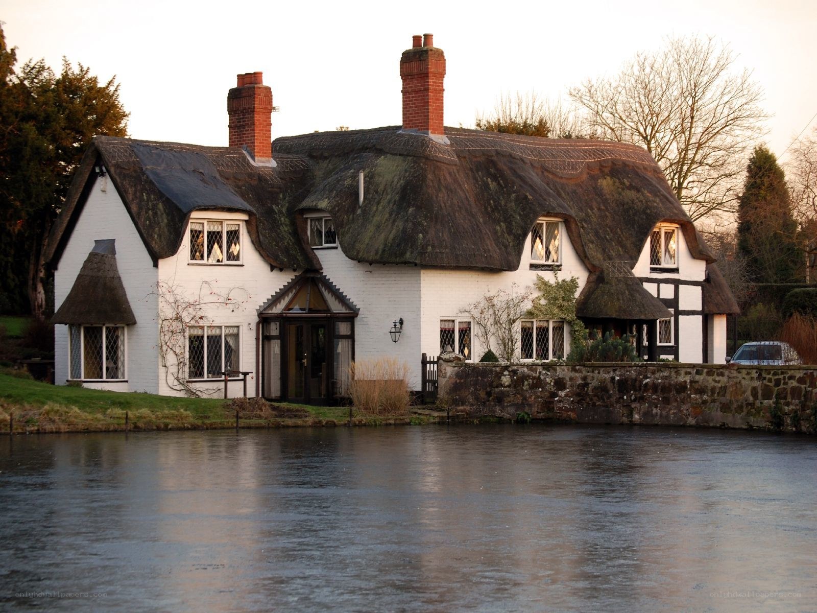 Thatched cottage by the river