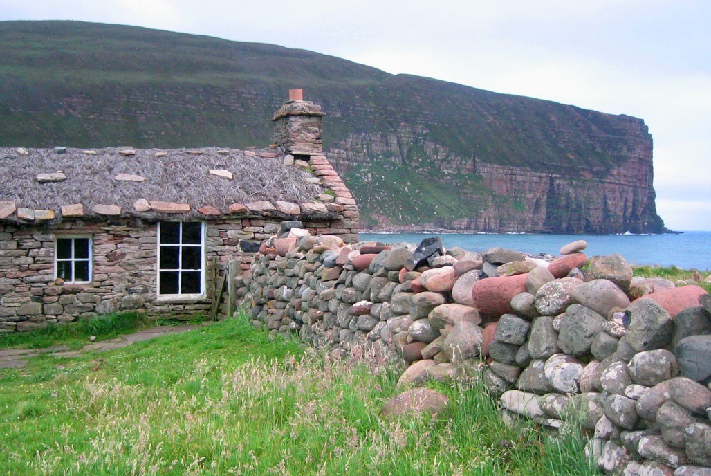 Thatched cottage by the sea
